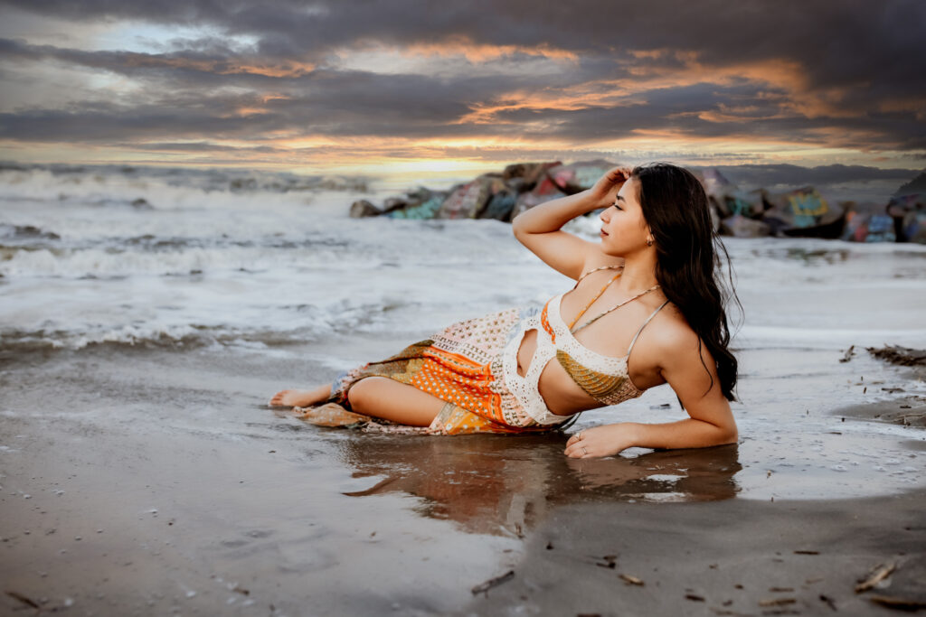 Senior photo at Folly Beach SC near Morris Island Light House by Neha Kotecha Photoraphy.