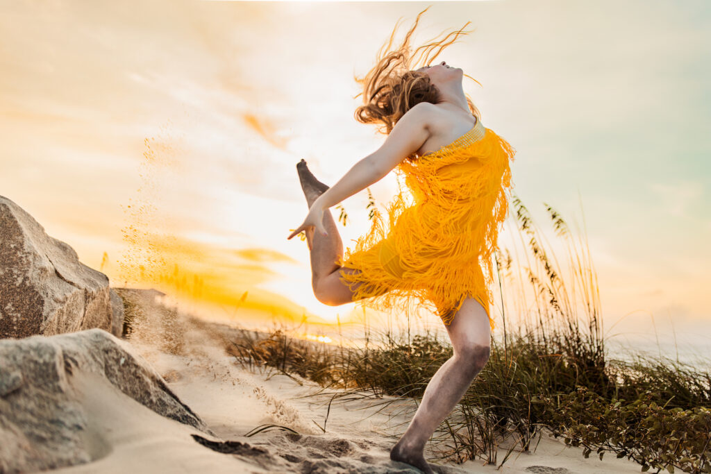 Senior photos at Folly Beach in Charleston South Carolina. 