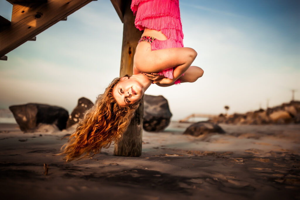 Senior photo at Folly Beach SC near Morris Island Light House by Neha Kotecha Photoraphy.